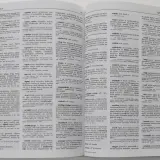 Stara książka z wyrazami obcymi, otwarta na stronie ze słowami na literę "S".
